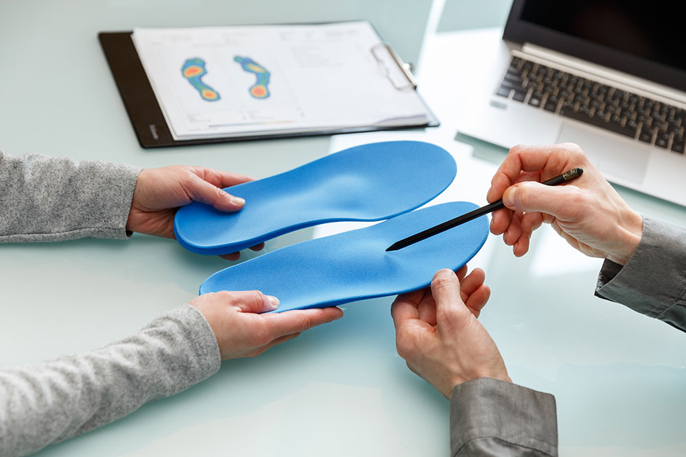 Custom orthotics clinical assessment and fitting
